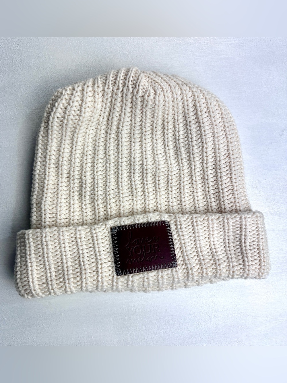Love Your Melon Cream Knit Beanie with Leather Patch